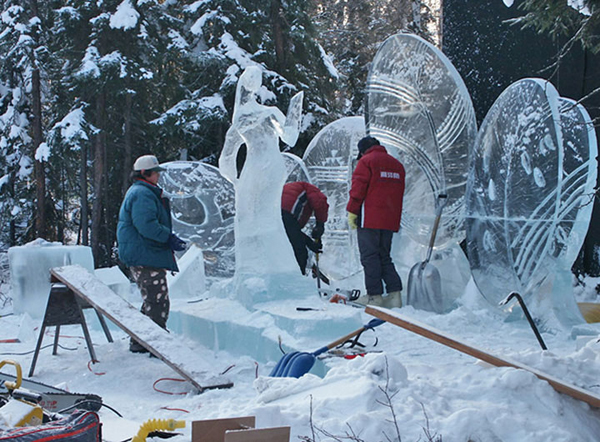 Artists working on ice sculpture “Spring,” World Ice Art Championships, 2006.