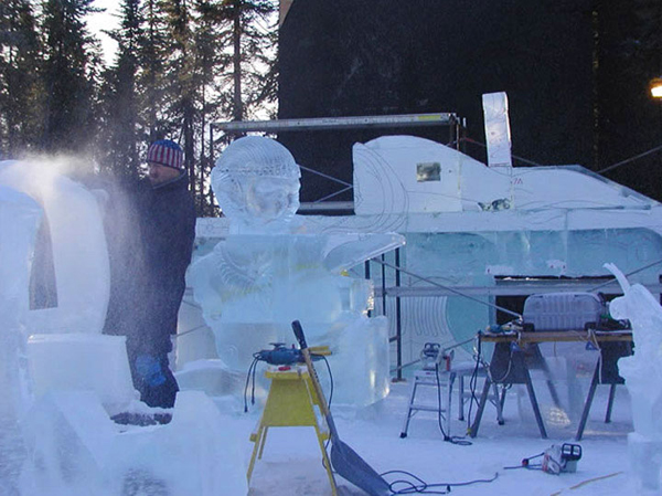 “Birth of Blue Bird,” by Junichi Nakamura and his team for Ice Alaska’s World Ice Art Championships. Work in progress. Artist working, using powertools, daytime.