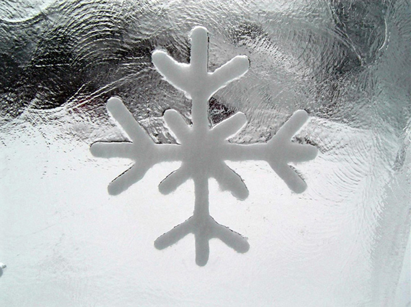 Kai Tormikoski sculpture “Four Seasons,” detail of the panel with the snowflakes. Another image of the texture of the snowflake. Kalajoki, Finland 2004.