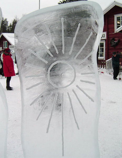 “Kai Tormikoski and Mauno Akhkisalo's sculpture "Four Seasons" 4 ice panels with simple elements of weather carved into them, representing the seasons. Kalajoki, Finland 2004. Detail of “sun panel.”